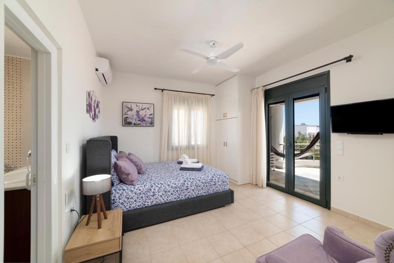 Paradisos Luxury Villas Next To Beach Koutsourás Extérieur photo